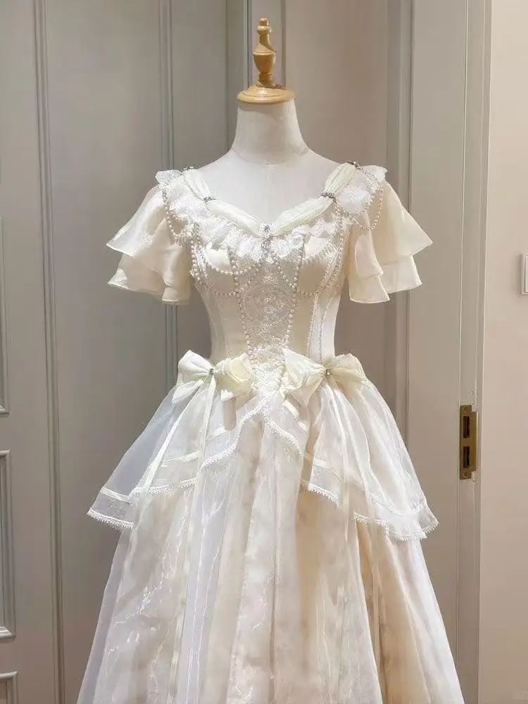 فستان بتصميم فيونكة عتيقة على  - مراجعة French Vintage Floral Midi Dress وسعره